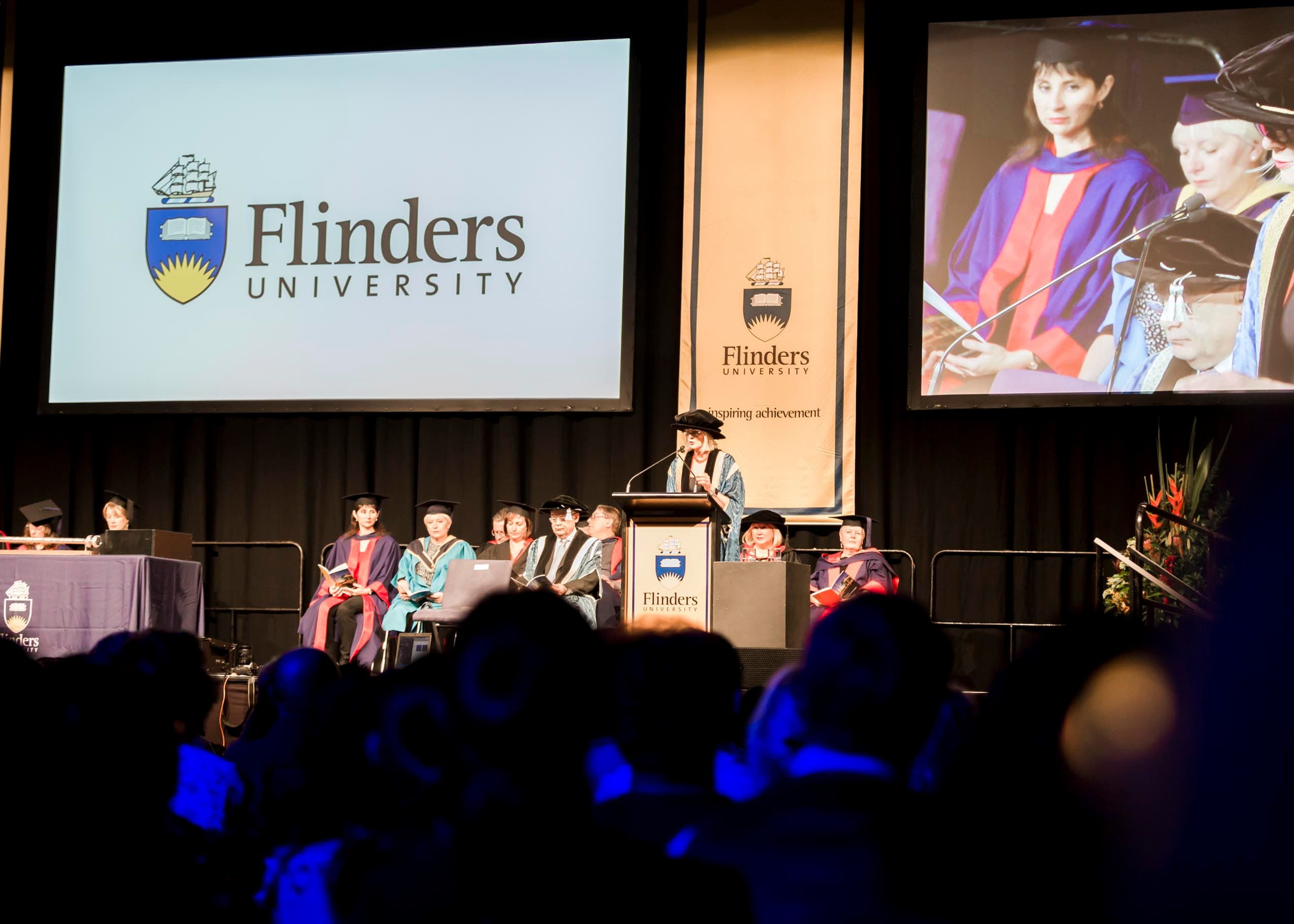 Family photo with a graduate in cap and gown