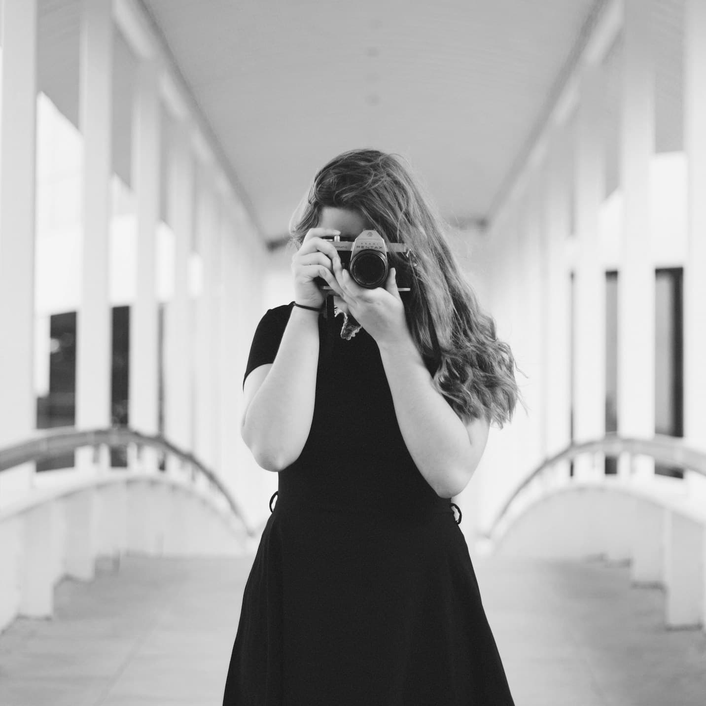 Professional photographer with camera