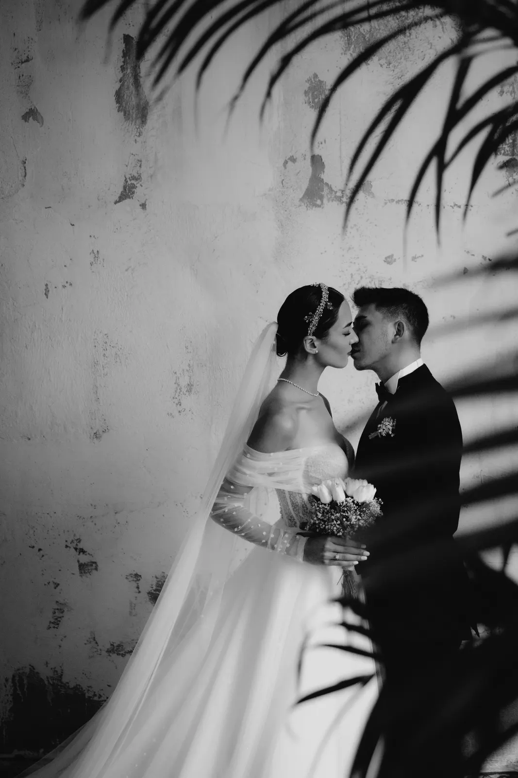 Bride and groom smiling at each other